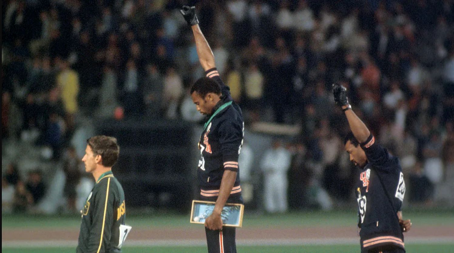 The Black Powered Salute by Tommie Smith &amp; John Carlos [Image Source: Getty]