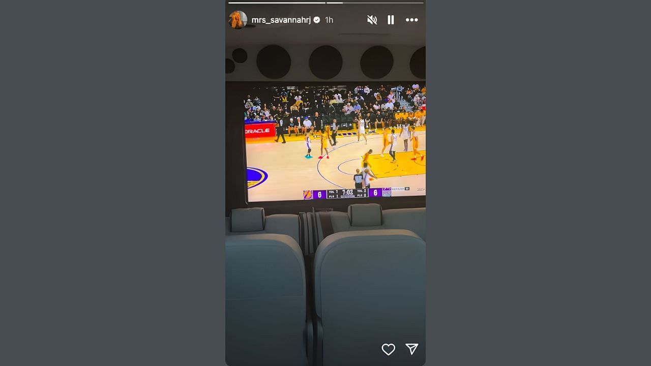 Savvanah James watching Bronny's debut game. (Credits: @mrs_savannahrj/Instagram)