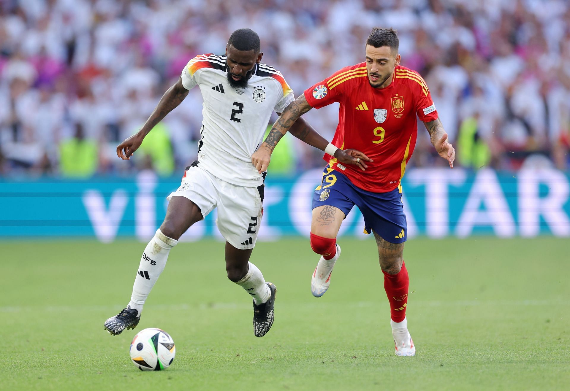 Antonio Rudiger (L)