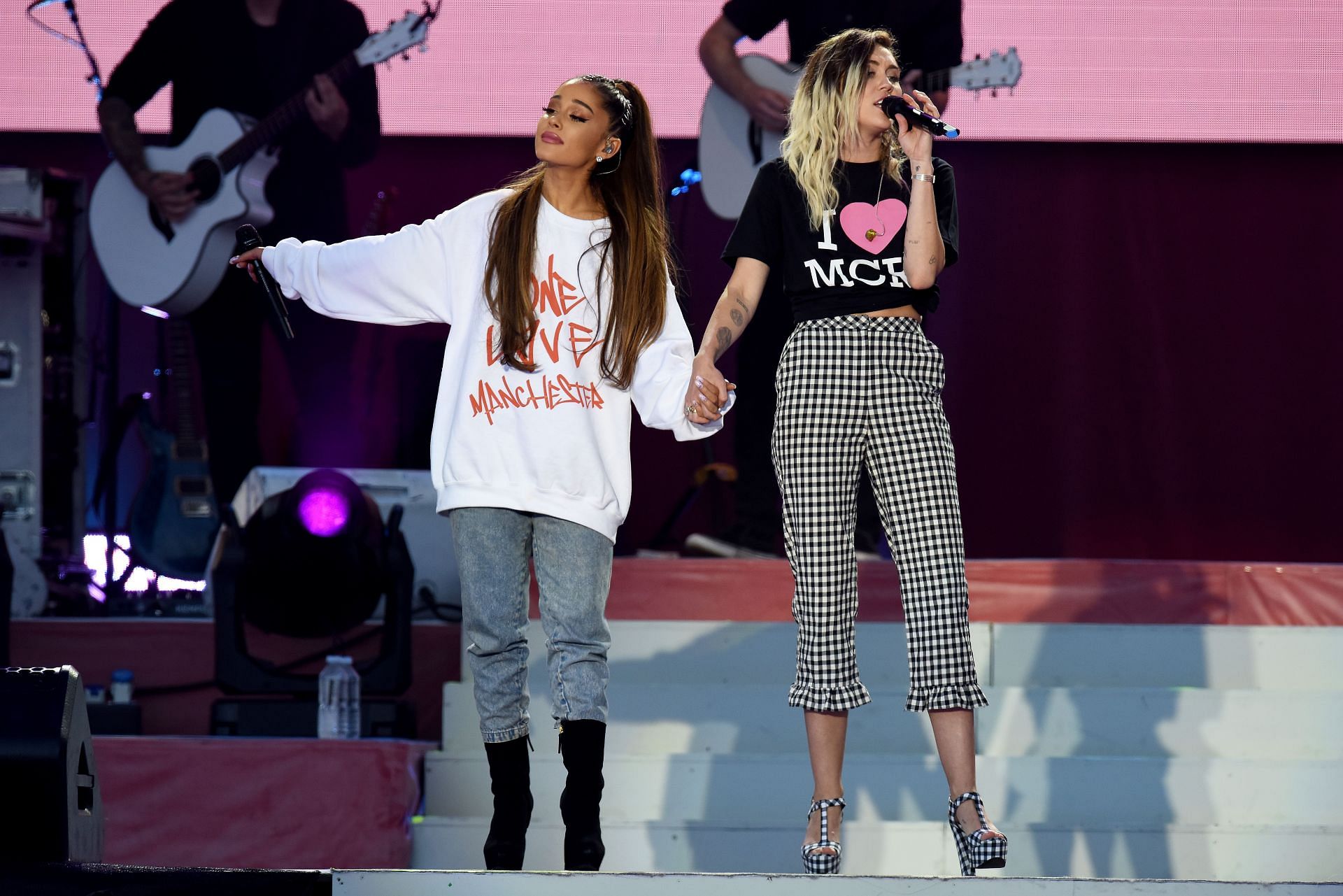 Grande and Cyrus Performing At One Love Manchester Benefit Concert (Image via Getty/Dave Hogan)