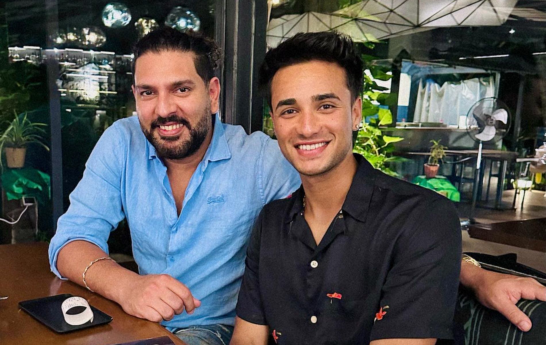Yuvraj Singh (L) and Abhishek Sharma (R).