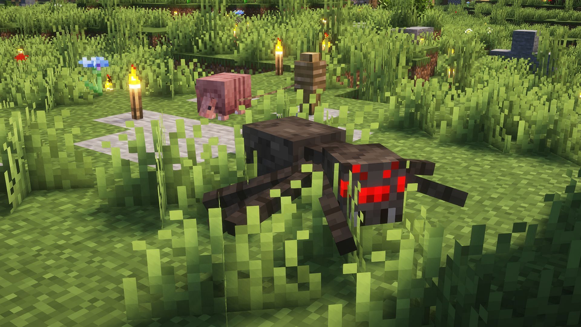 A regular spider running from an armadillo (Image via Mojang)