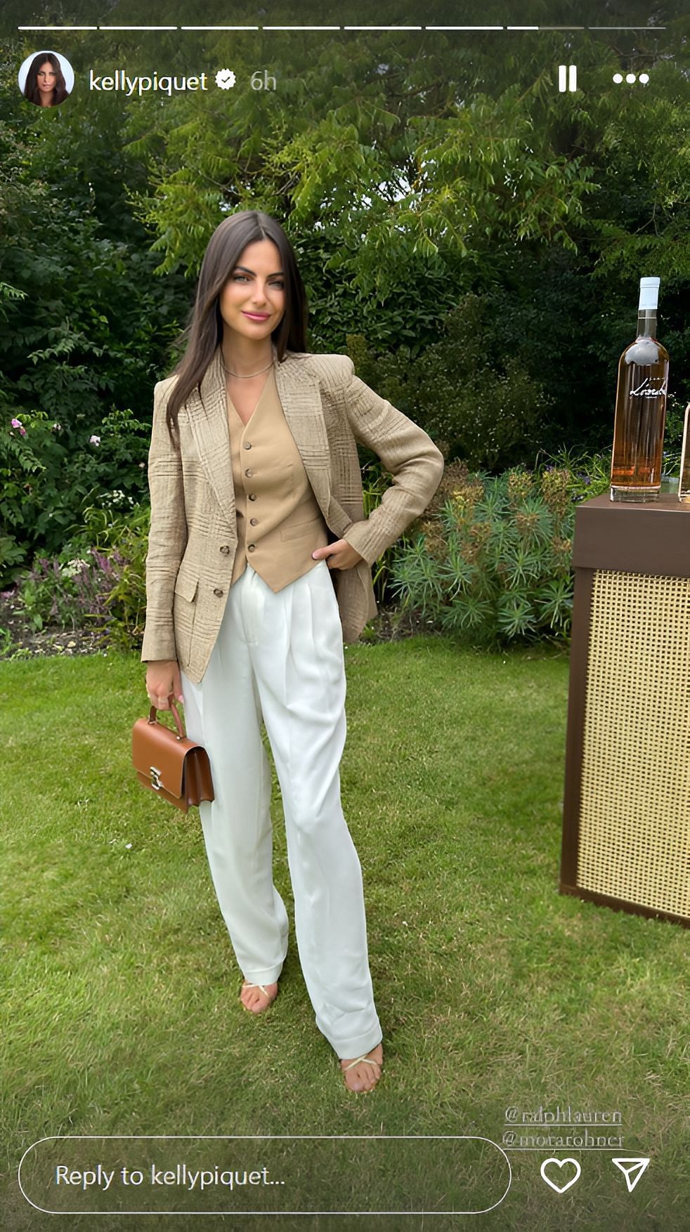 Kelly Piquet posing in a Ralph Lauren outfit