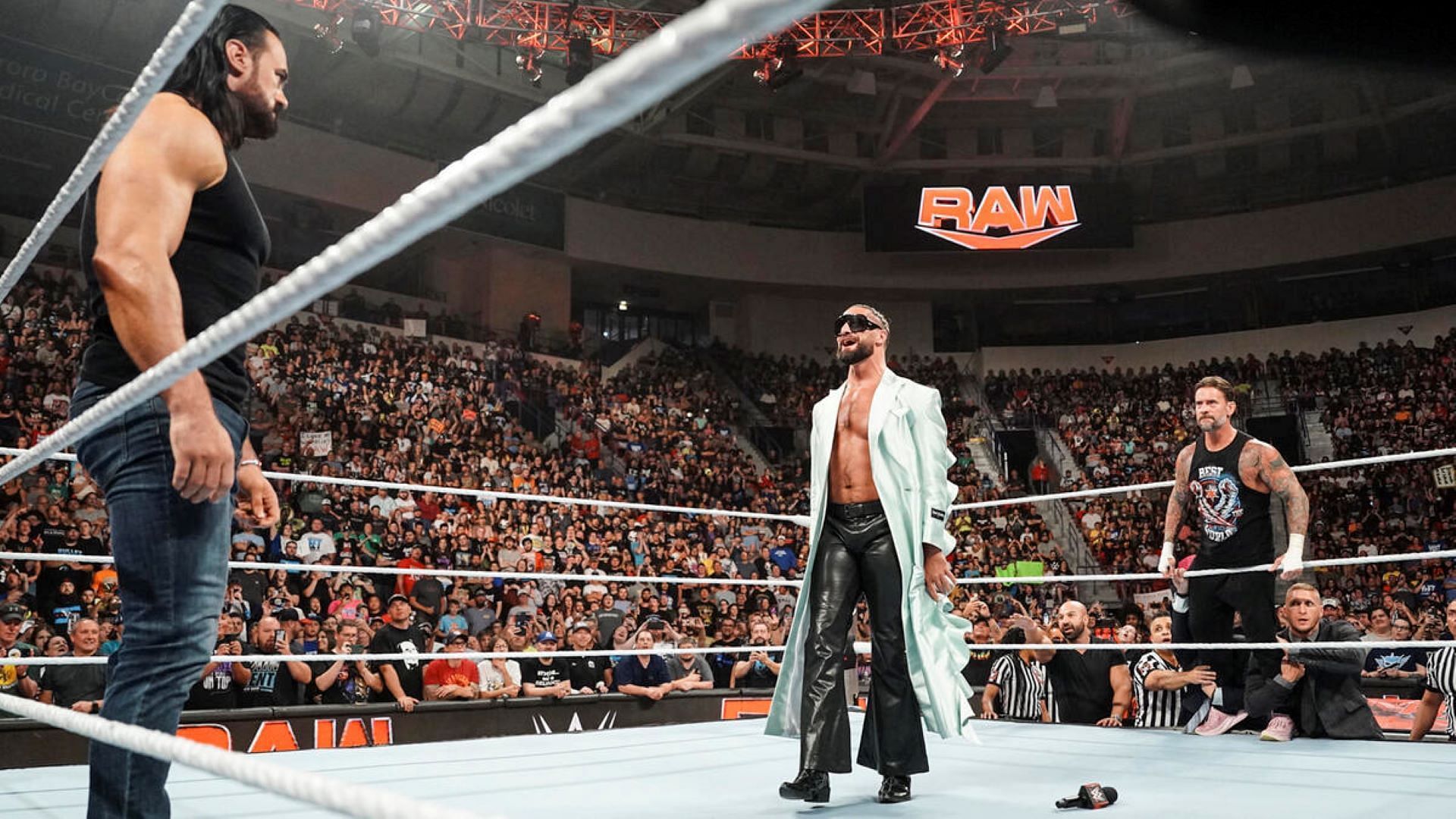 Seth Rollins will be the man in the middle when Drew McIntyre faces CM Punk at SummerSlam. {Image Credit: WWE.com}