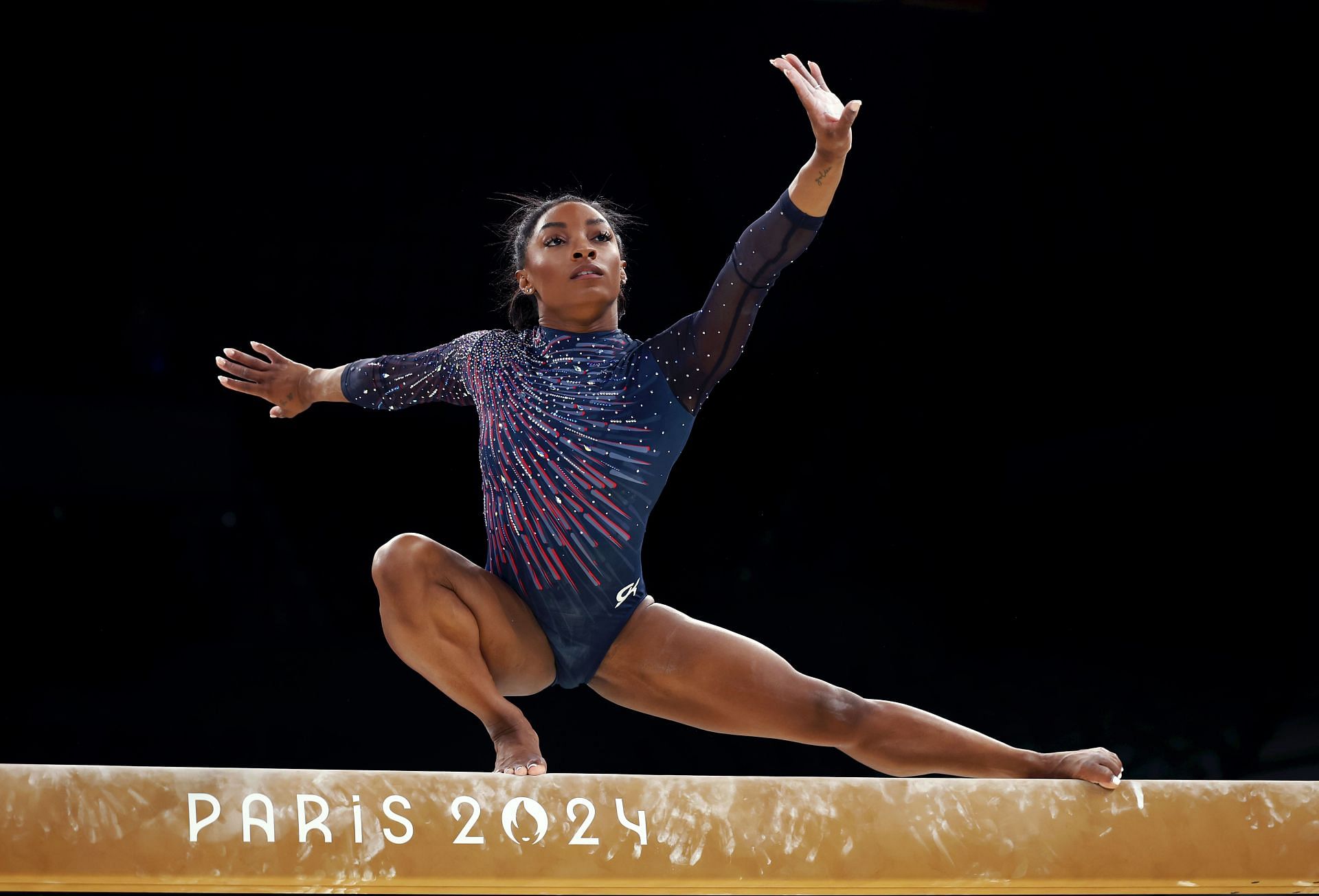 Simone Biles practices on the balance beam during a Gymnastics training session ahead of the Paris 2024 Olympics in France. (Photo by Getty Images)