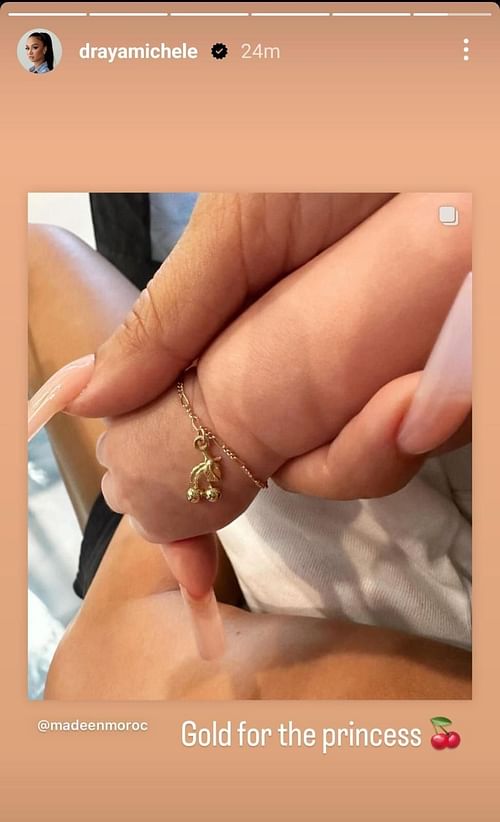 Draya Michele shows daughter's gold bracelet (via @drayamichele on Instagram) 