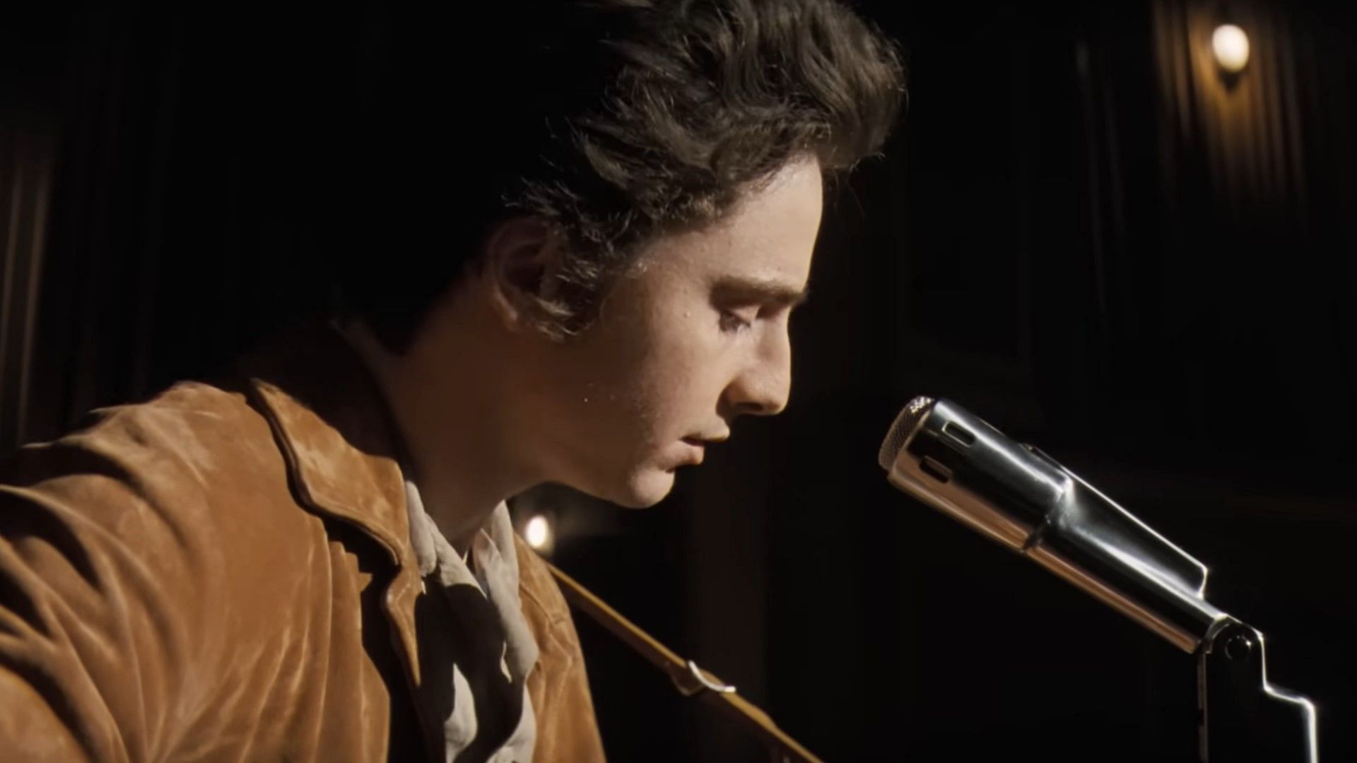 Timoth&eacute;e Chalamet as Bob Dylan in A Complete Unknown (Image via YouTube/Searchlight Pictures)