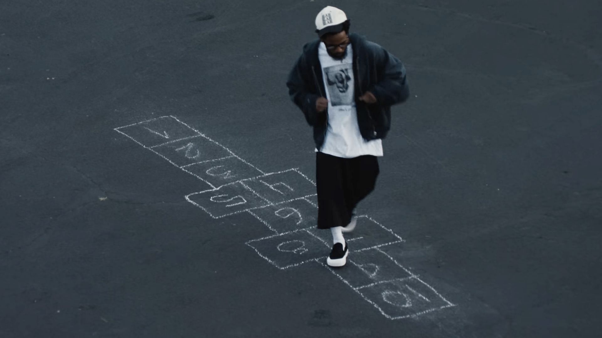 Kendrick Lamar plays hopscotch in the music video for &#039;Not Like Us&#039; (Image via YouTube/@kendricklamar)