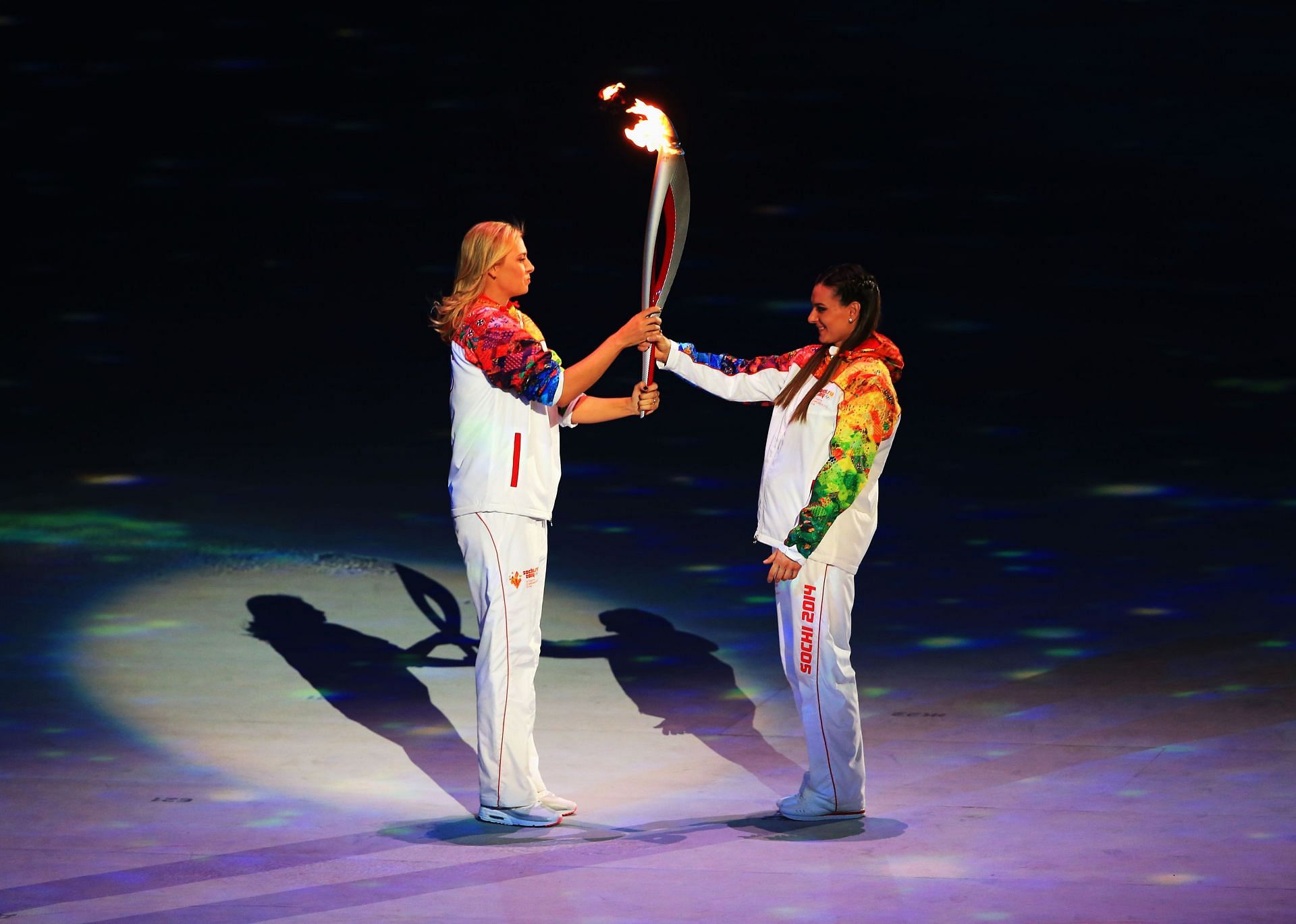 Maria Sharapova (L) at the 2014 Winter Olympic Games. (Photo: Getty)