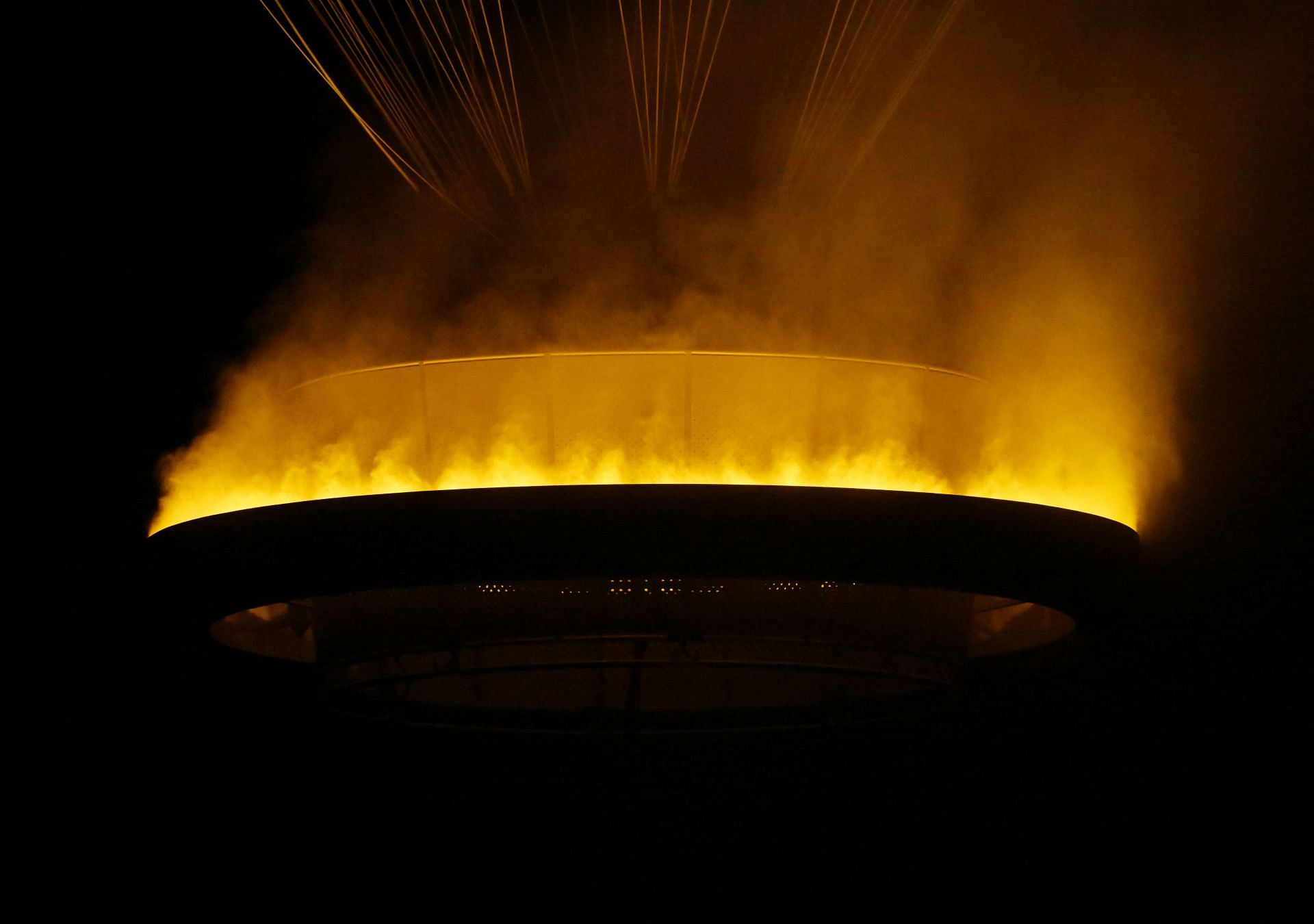 The Olympic cauldron alight during the Paris Olympics [Image Source: Getty]