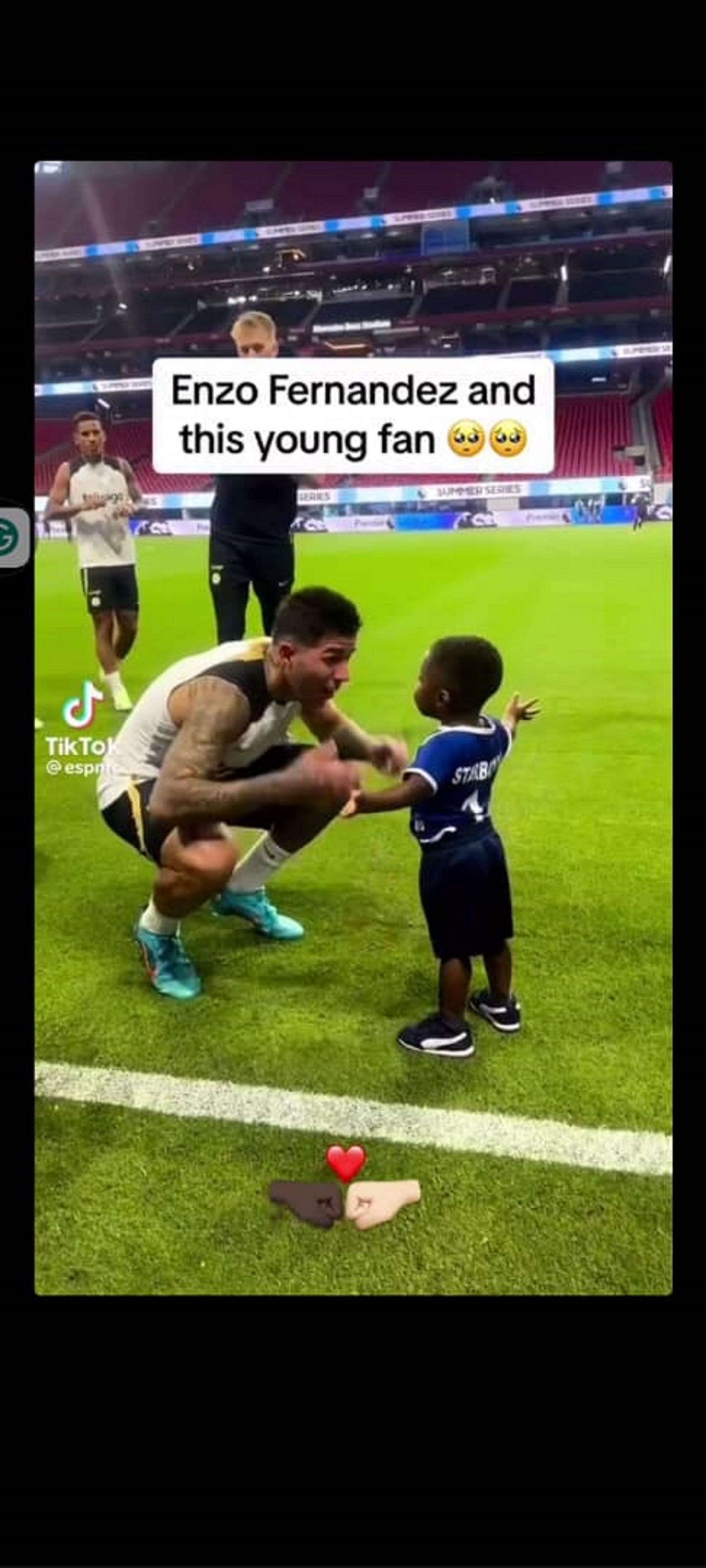 Jackson's post showing Enzo Fernandez with a black child