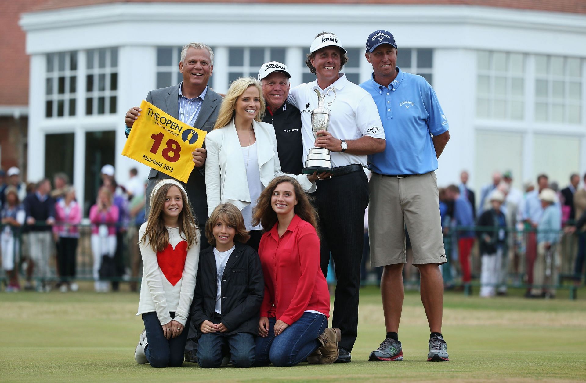 Phil Mickelson poses with his family after winning the Open Championship in 2013 (Image via Getty)