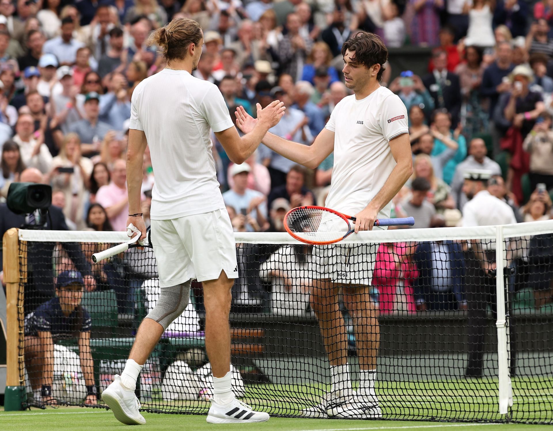 Alexander Zverev (L) and Taylor Fritz (R) after their Wimbledon 2024 fourth-round match (Source: GETTY)