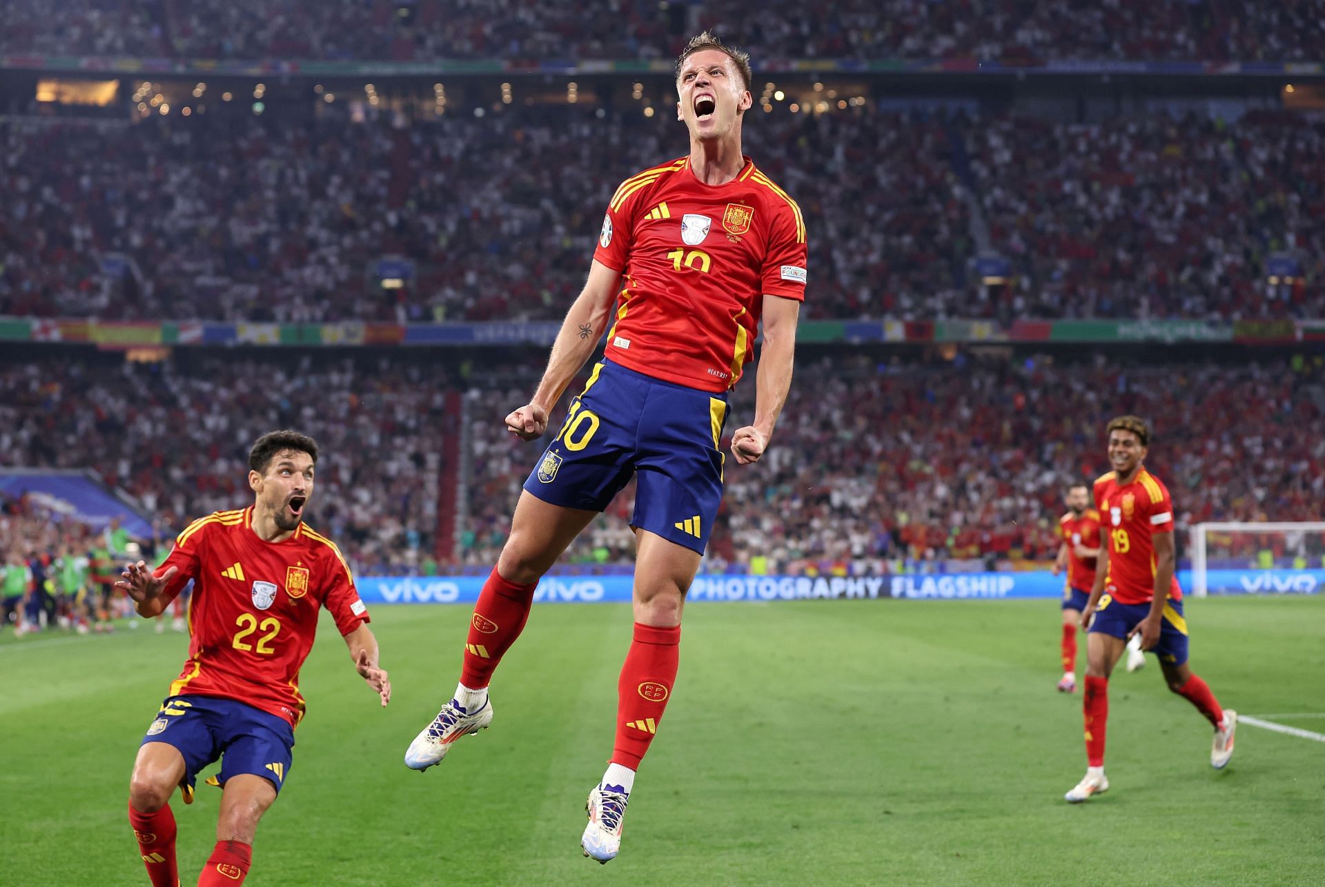 Spain striker Dani Olmo (centre)