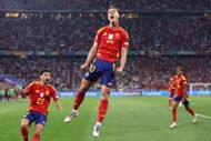 Spain striker Dani Olmo (centre)