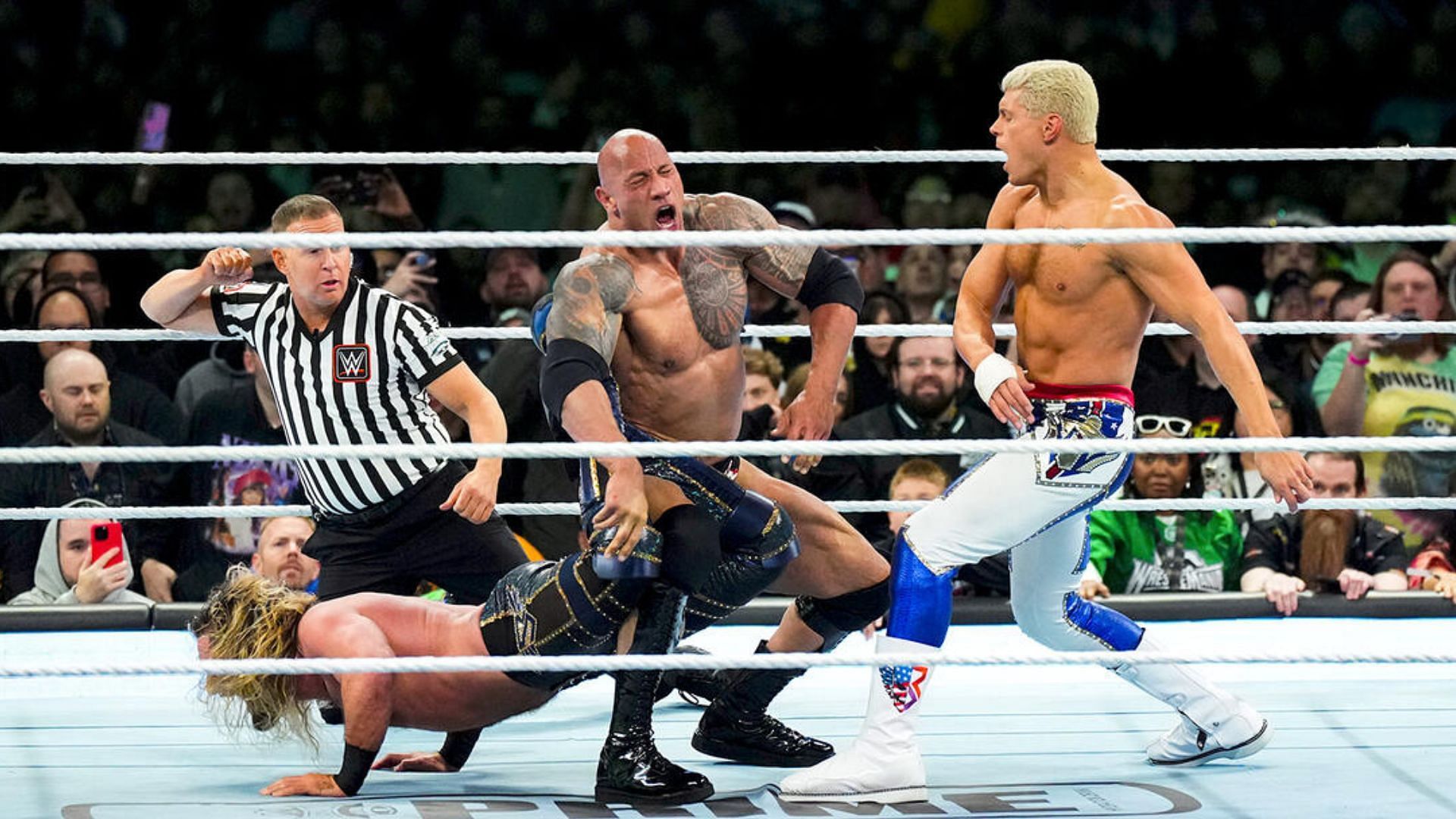 The Rock, Cody Rhodes, and Seth Rollins at WrestleMania XL! [Image credit: WWE.com]