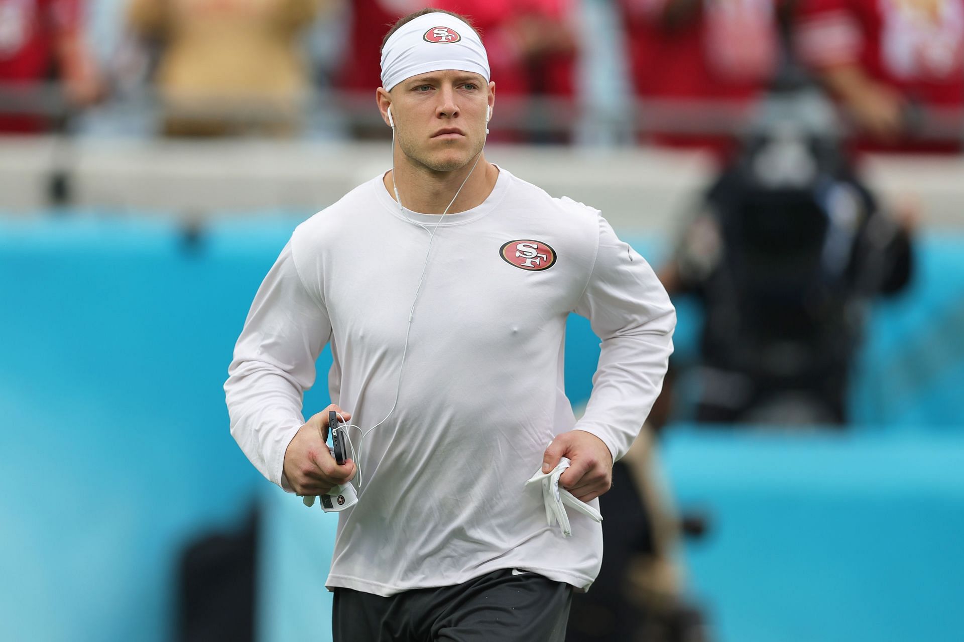 Christian McCaffrey of the San Francisco 49ers warms up