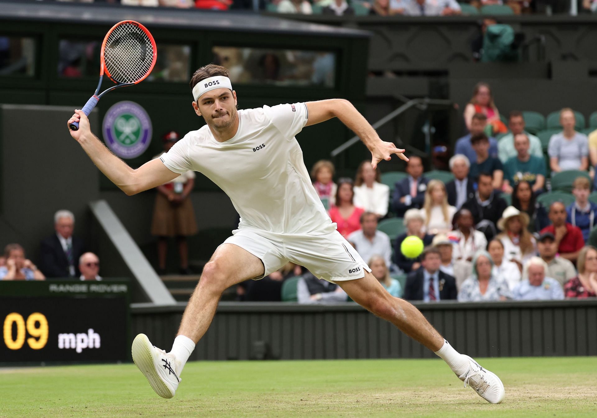 Taylor Fritz plays a forehand at Wimbledon. (Getty)