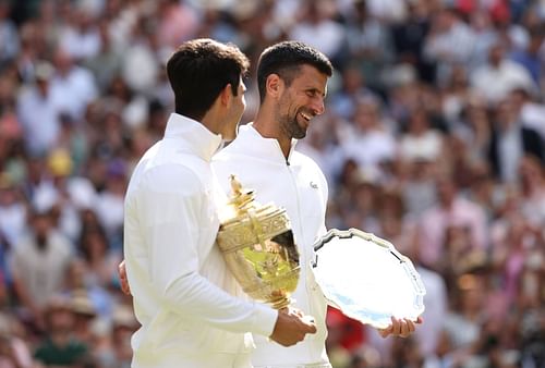 Novak Djokovic and Carlos Alcaraz with the Wimbledon trophies (Source: GETTY)