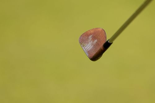 Tiger Woods rusty wedge at The 152nd Open - Preview Day One (Image via by Kevin C. Cox/Getty Images)