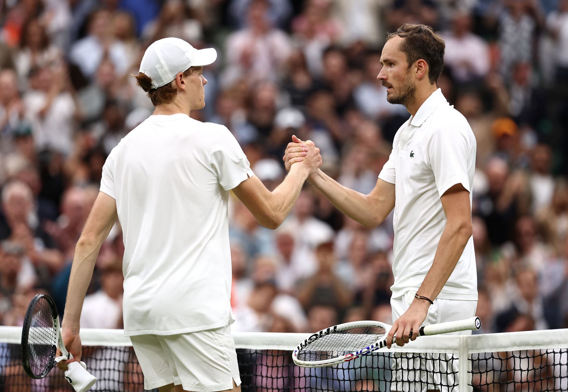 Jannik Sinner and Daniil Medvedev at The Championships - Wimbledon 2024.