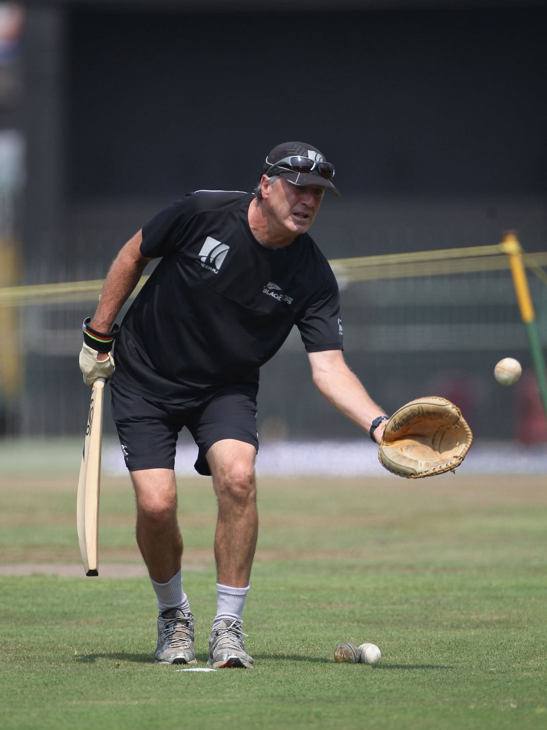 New Zealand coach John Wright catches a ball during the New Zealand nets session at the R Premedasa Stadium on March 28, 2011 in Colombo, Sri Lanka. (Photo by Tom Shaw/Getty Images)