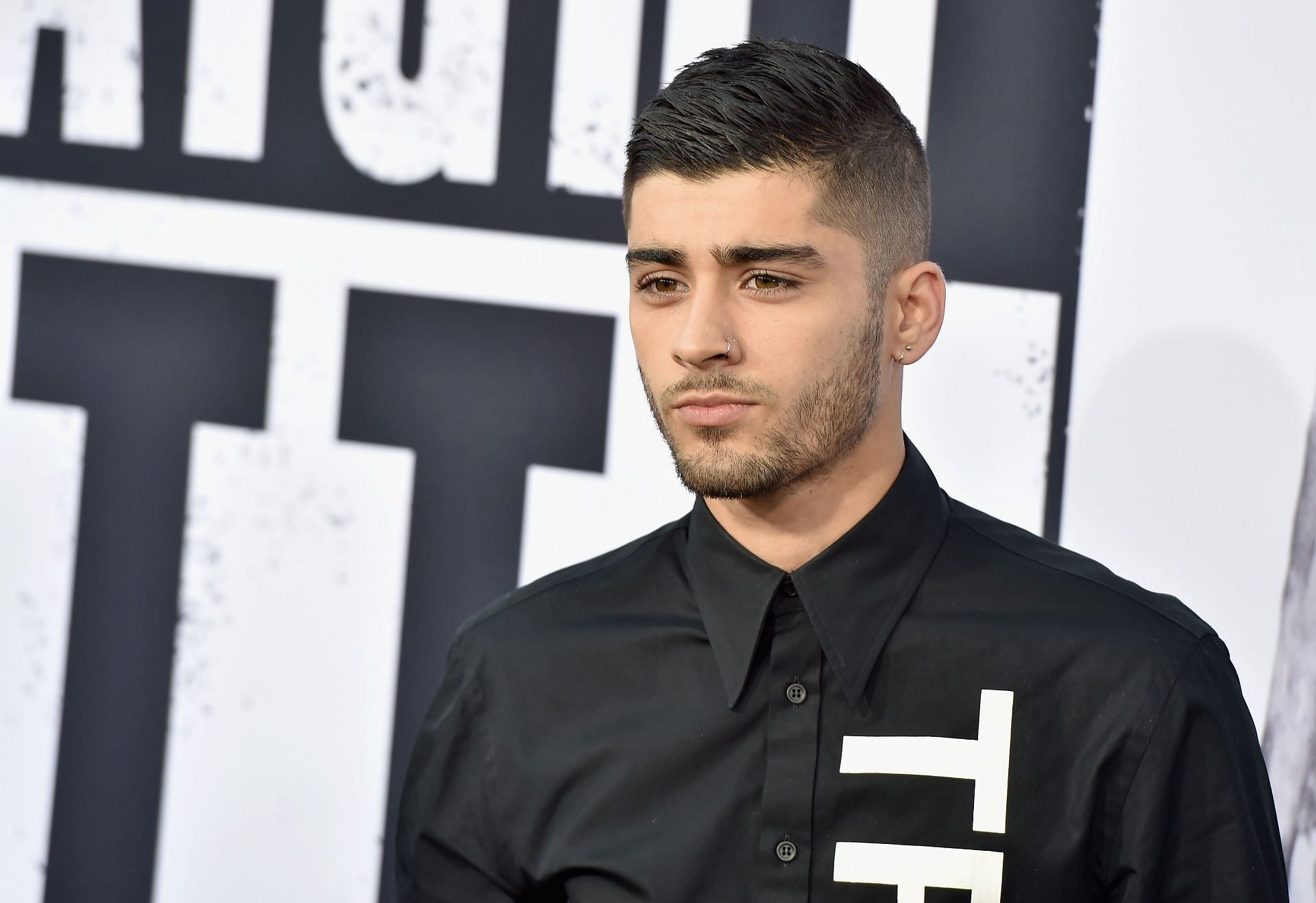 Zayn Malik celebrated the release of Room Under the Stairs with one-off concerts in the UK (Image via Kevin Winter/Getty Images)