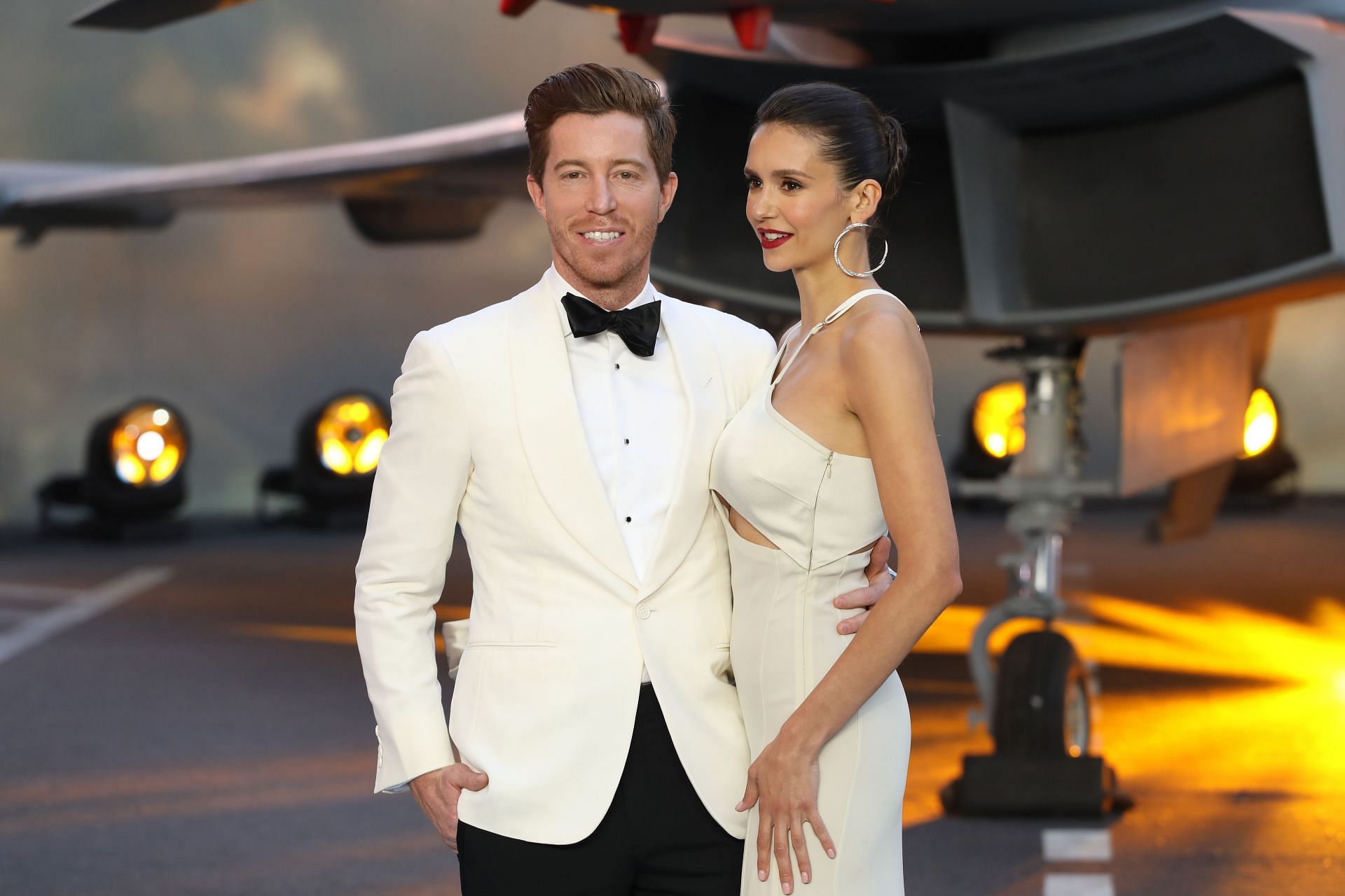 Shaun white on Nina Dobrev during The Royal Film Performance &amp; UK Premiere of &quot;Top Gun: Maverick&quot;