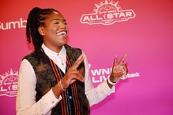 Watch: Jonquel Jones describes designer attire as she rocks Louis Vuitton, Burberry and Gucci for WNBA's orange carpet