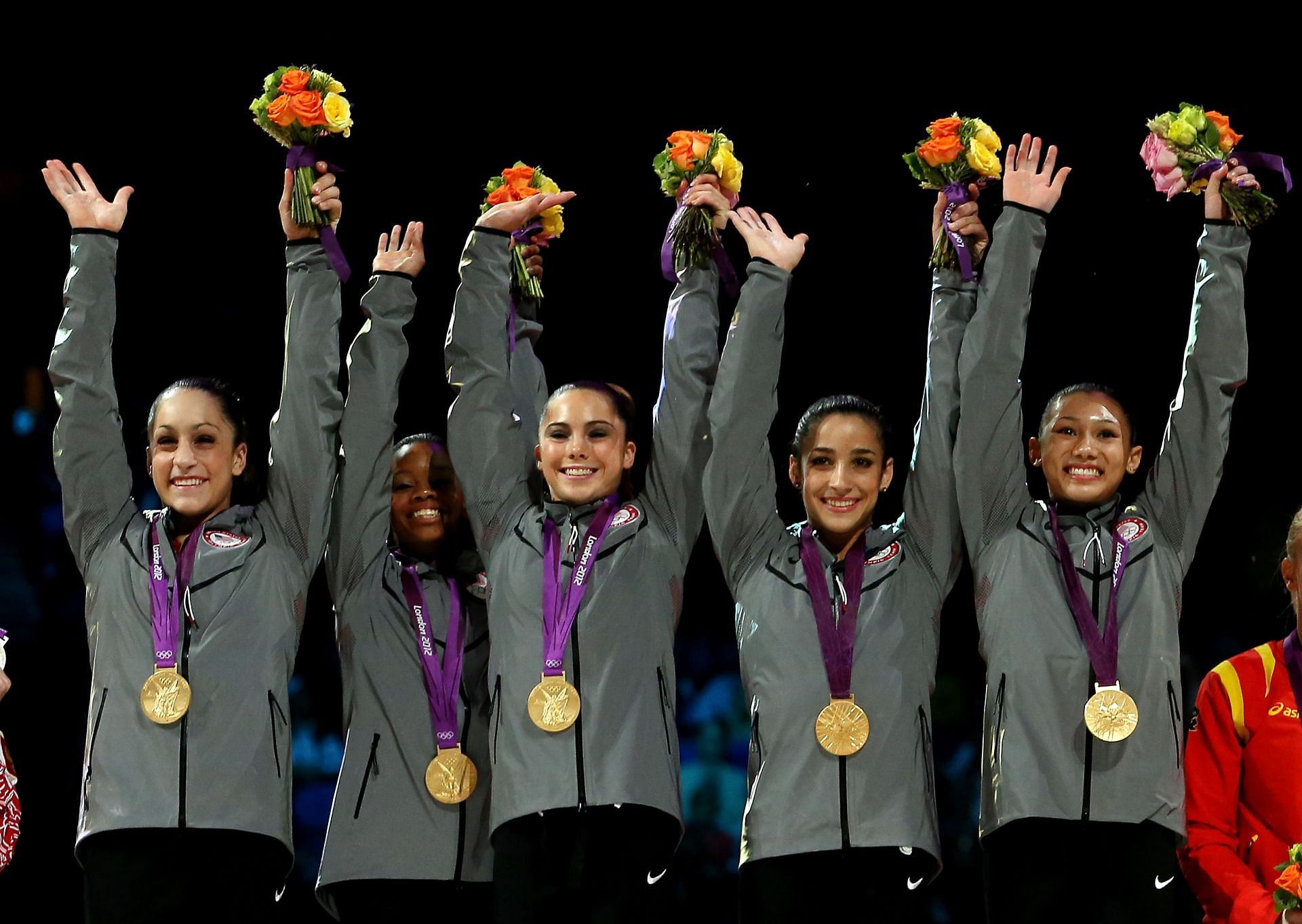 McKayla Maroney [C] with the victorious American team at London Olympics 2012