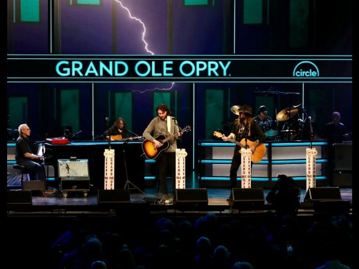 Braison Cyrus on stage with father, Billy Ray Cyrus, at Grand Ole Opry (Image via Instagram/ @billyraycyrus)