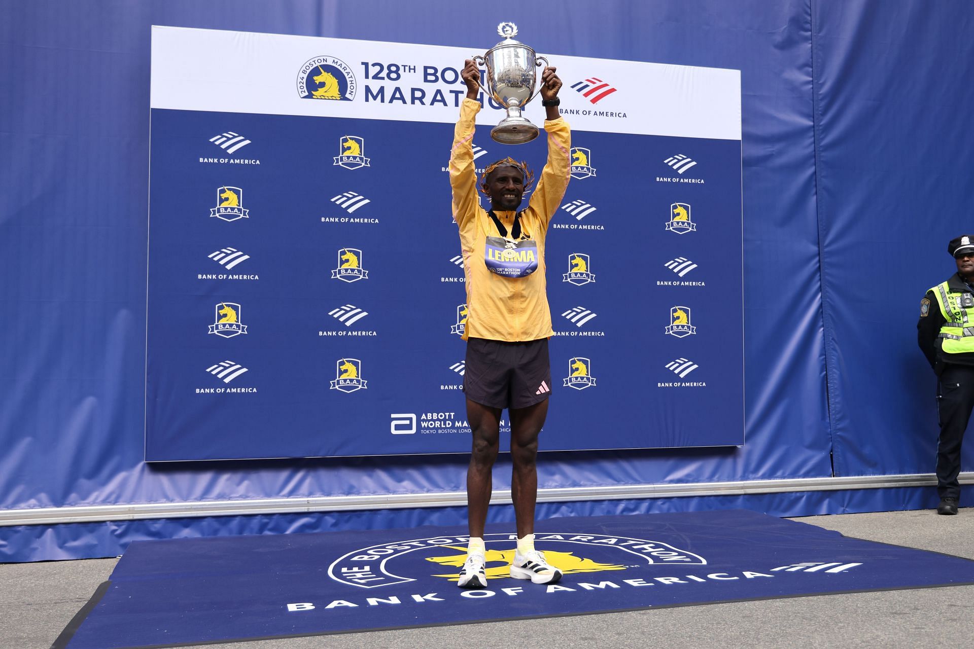 Sisay Lemma of Ethiopia with the Boston Marathon Trophy [Image Source: Getty]