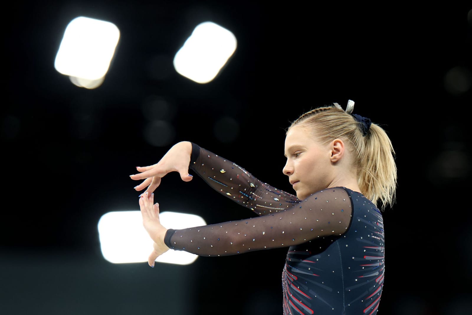 Jade Carey suffers a dramatic fall in floor exercise during the