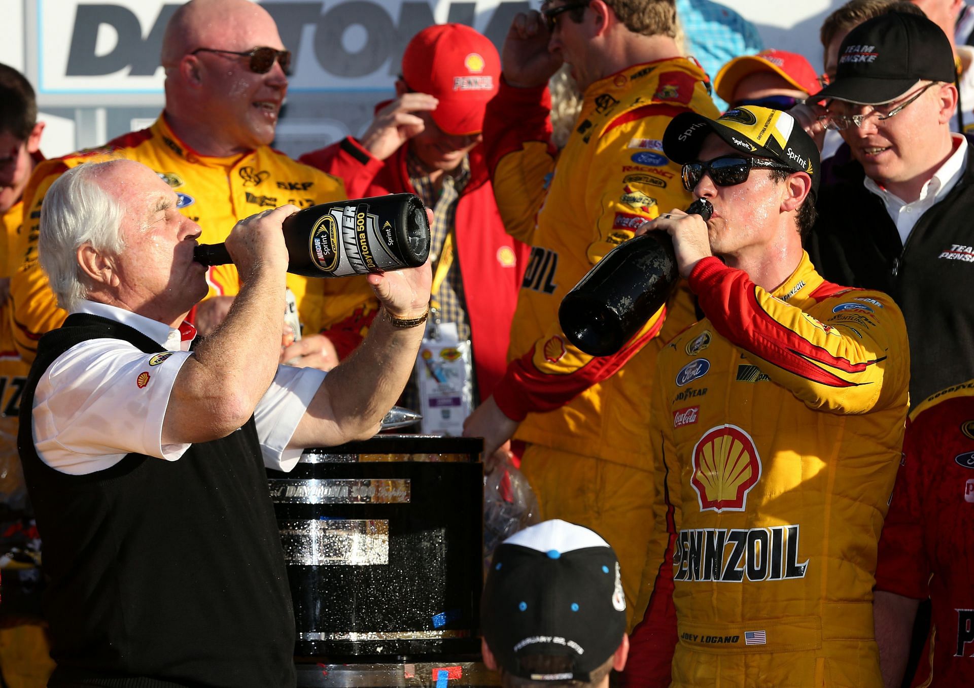 Roger Penske with two-time Cup Series champion Joey Logano (image source- Getty)