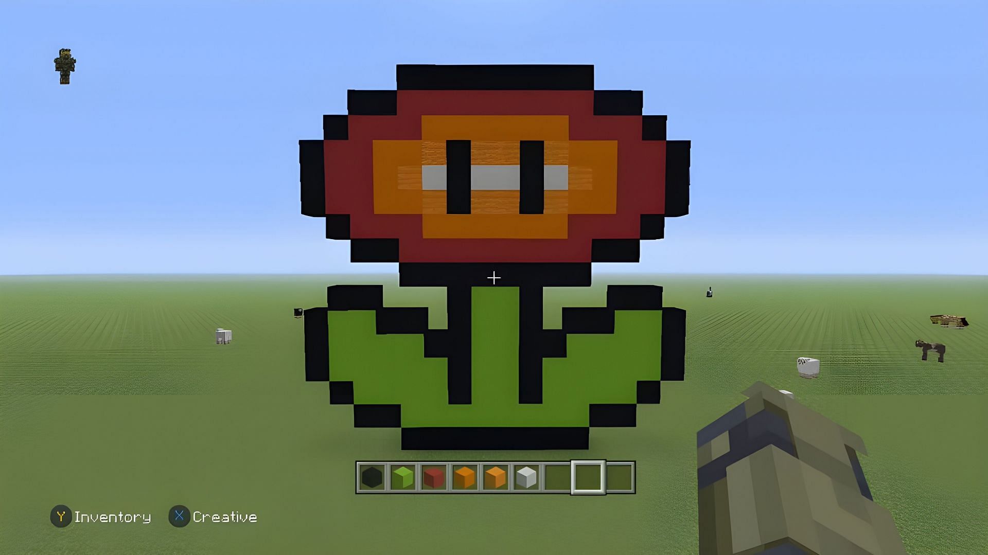 Mario Fire Flower Pixel Art (Image via YouTube/The Grande Gamer)