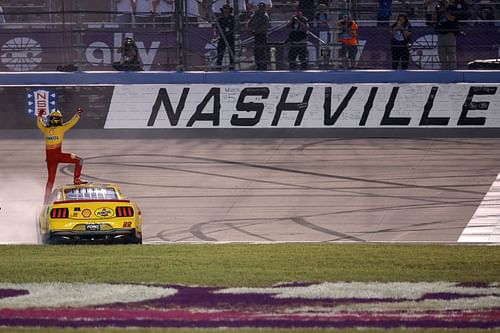 Joey Logano, driver of the #22 Shell Pennzoil Ford, celebrates after winning the NASCAR Cup Series Ally 400 at Nashville Superspeedway on June 30, 2024 in Lebanon, Tennessee. (Photo by James Gilbert/Getty Images)