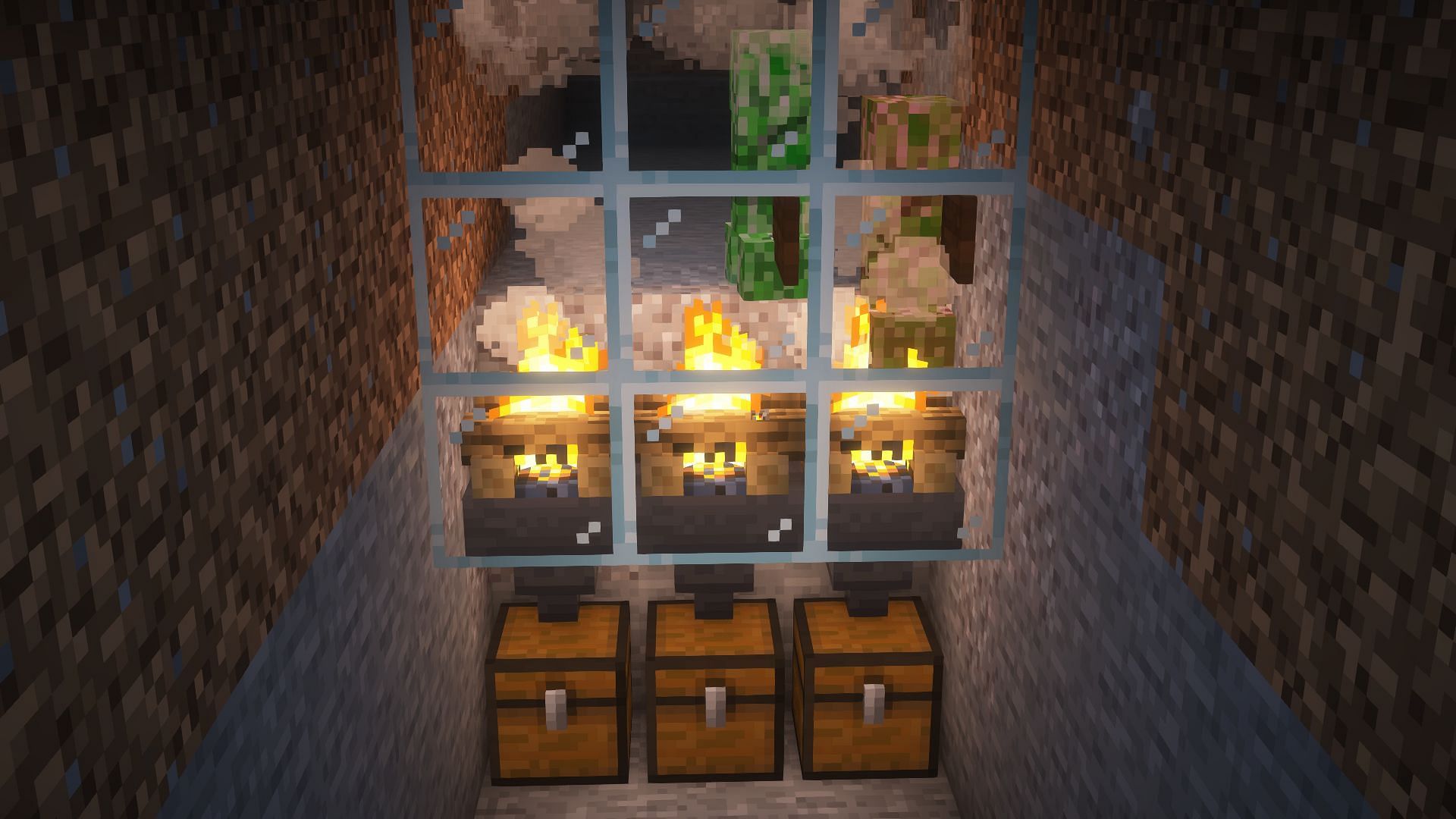 Creepers burning in the farm&#039;s collection system (Image via Mojang)