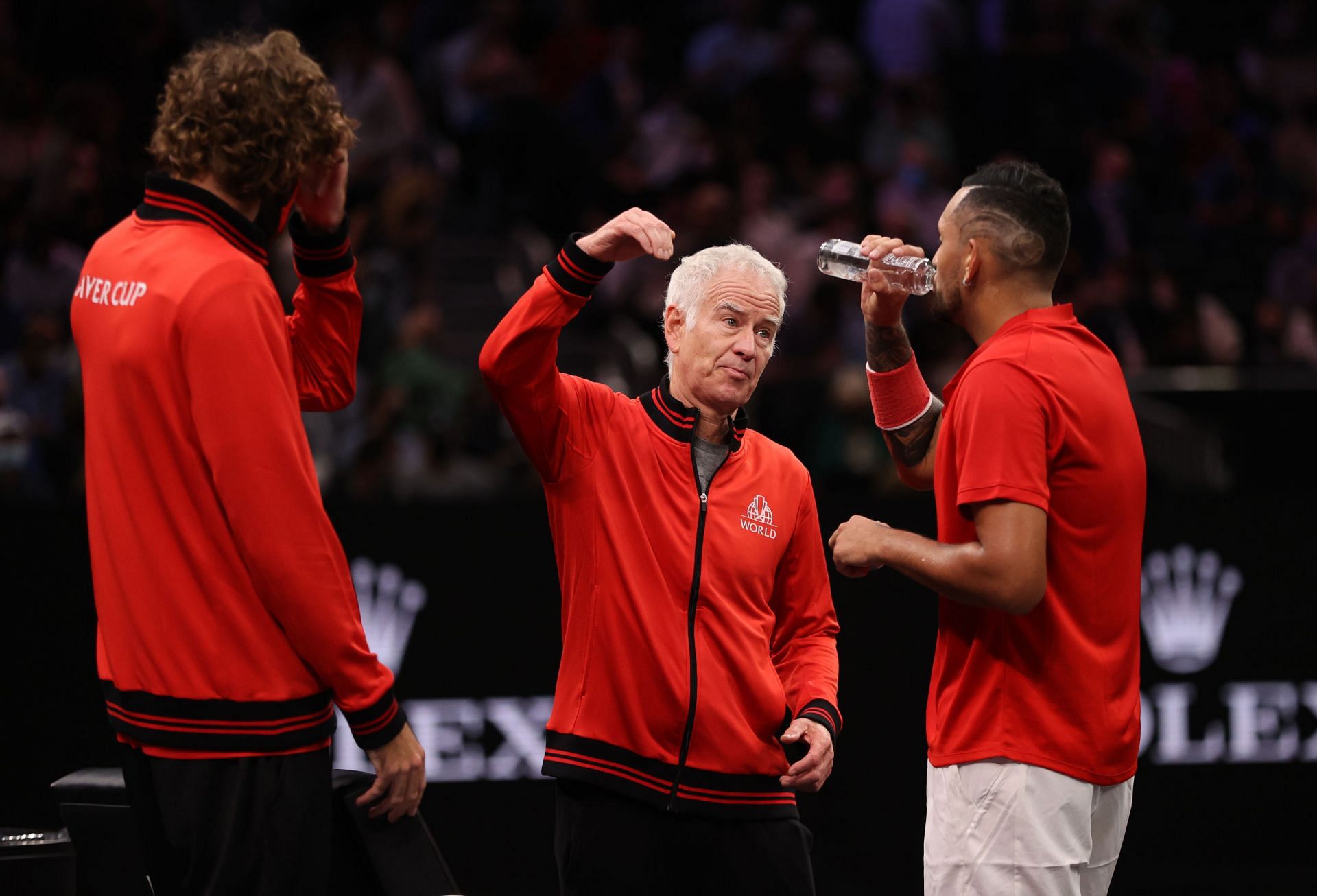 McEnroe (C) talks with Kyrgios (L) at the 2018 Laver Cup