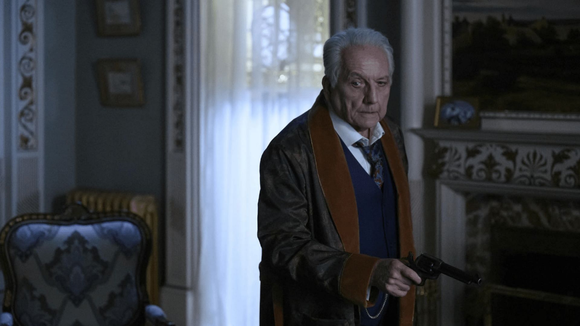 A still from The Inheritance: Charles takes out his revolver to shoot Drew (Image by Paul Schiff Productions)