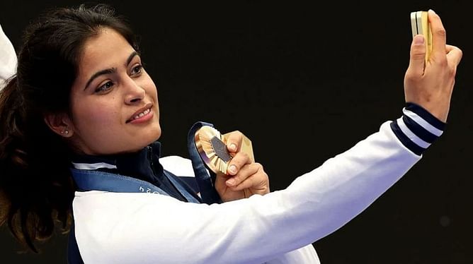 "Medal is bronze but look is pure gold" - Anand Mahindra on Manu Bhaker's bronze medal win; Sachin Tendulkar joins in as wishes pour in for shooter