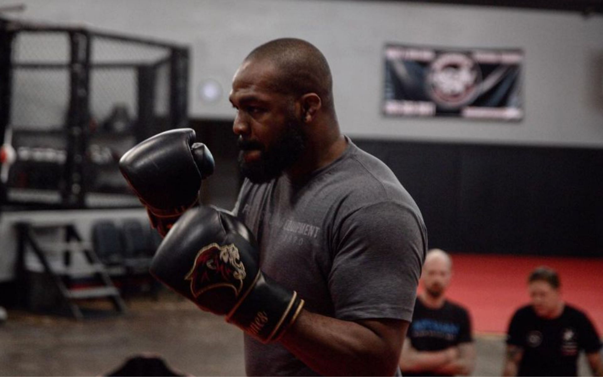 Jon Jones (pictured) reacts to Tom Aspinall calling him out at UFC 304. [Image courtesy: @jonnybones on Instagram]