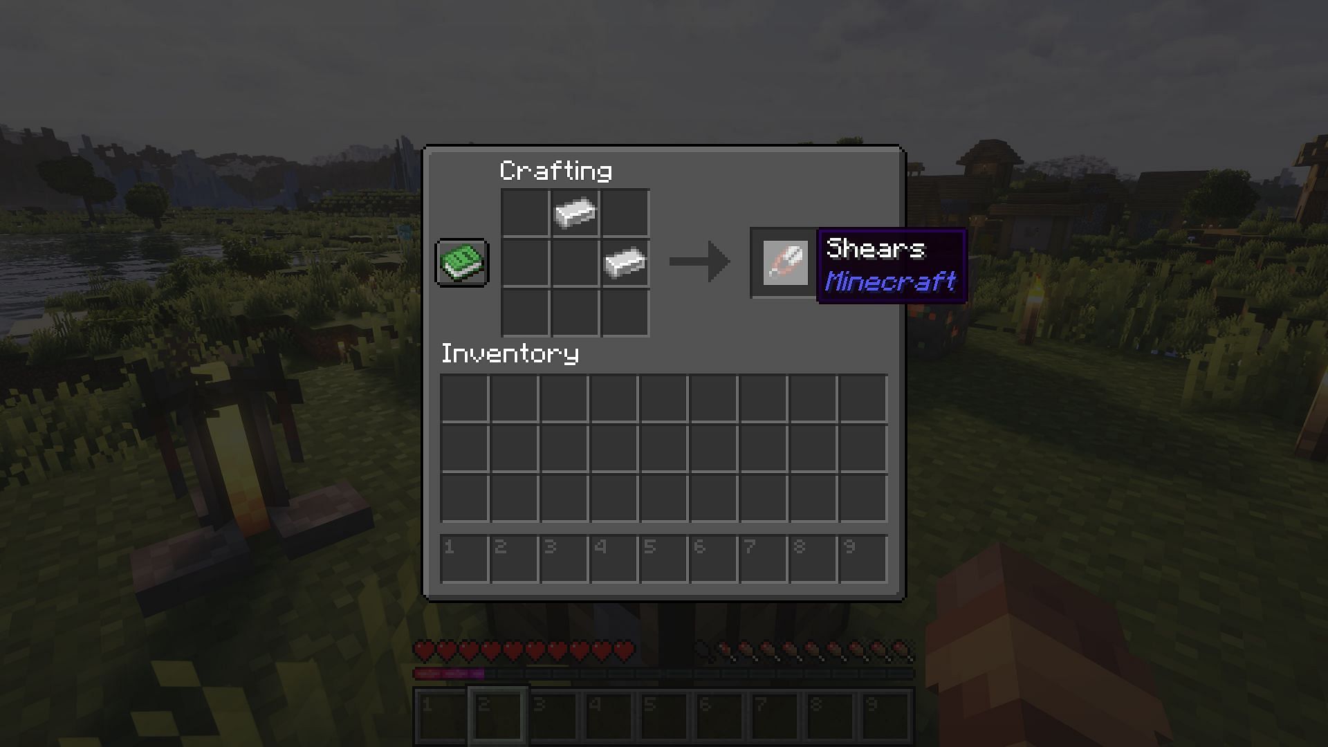 The crafting recipe for shears (Image via Mojang)