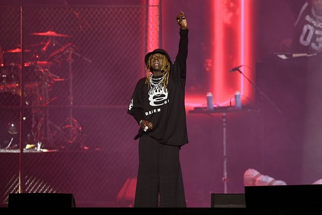 He saying they don't like us” — Kendrick fans respond as Lil Wayne raps  along 'Not Like Us' while holding OVO pendant