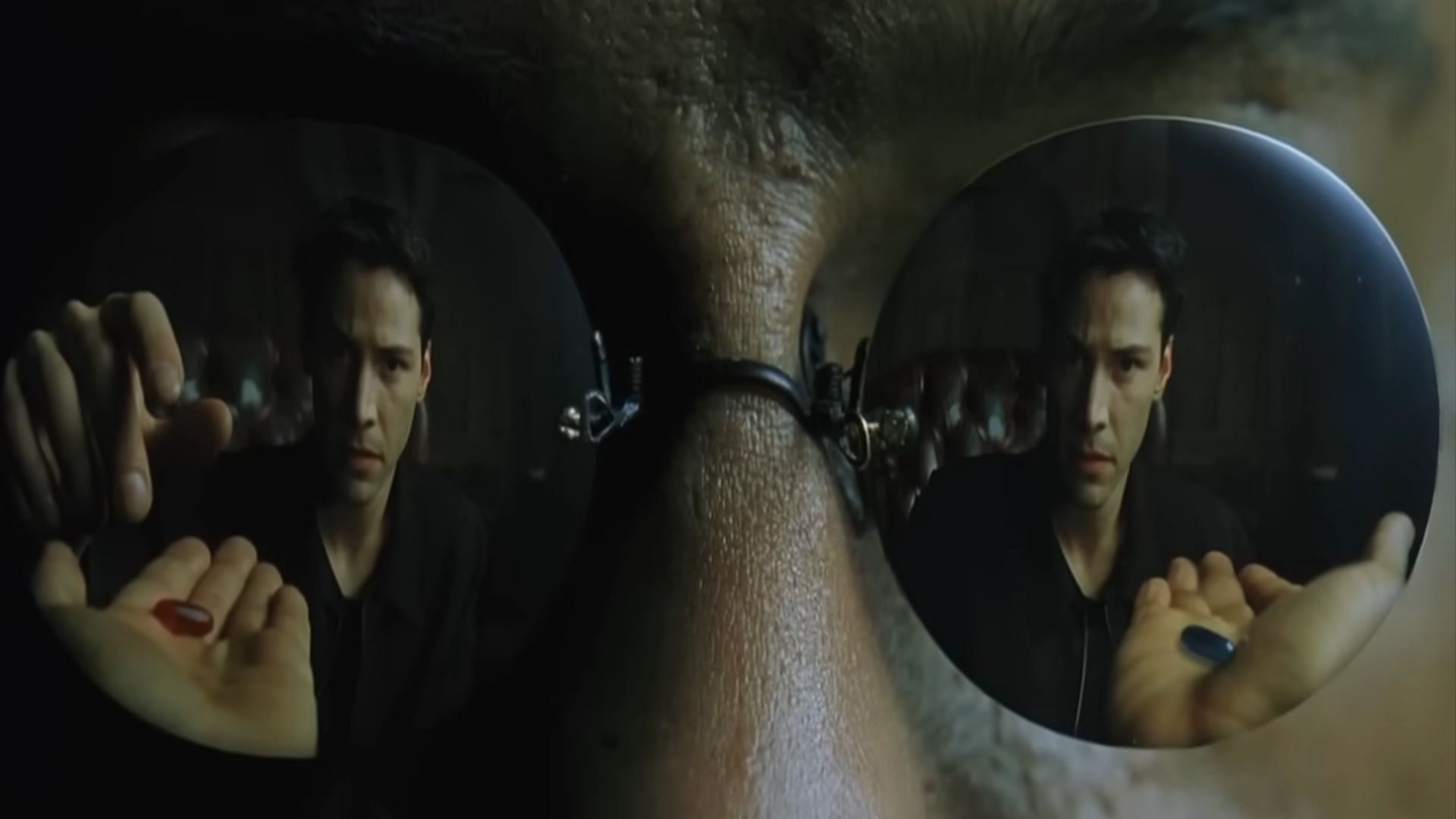 Morpheus presents Neo with the choice to take either the blue or the red pill (Image via Movieclips)