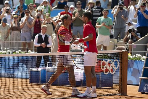 Rafael Nadal and Novak Djokovic shake hands at the net following the conclusion of their 2024 Paris Olympics second-round match (Source: Getty)