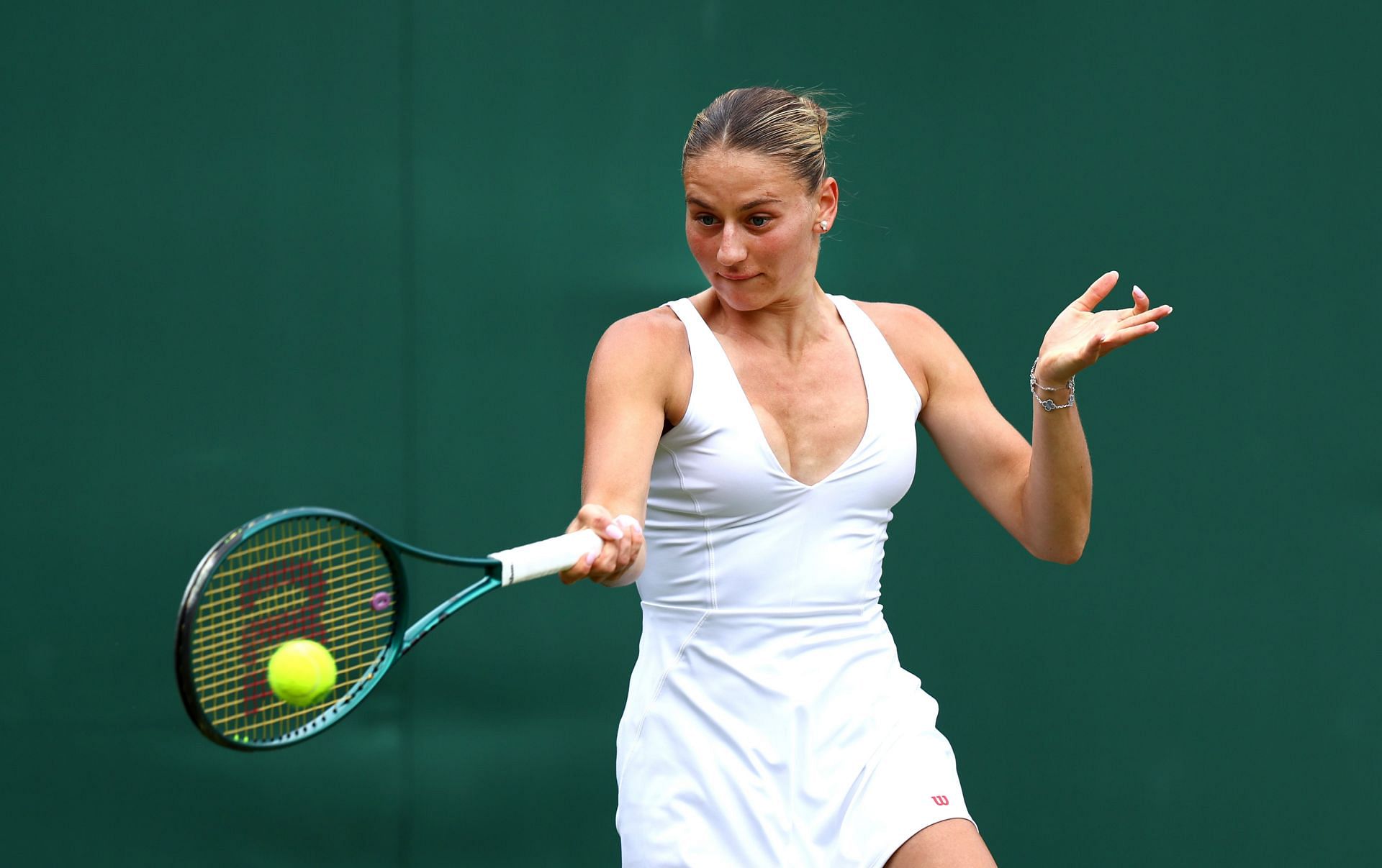 Marta Kostyuk in action at the 2024 Wimbledon Championships