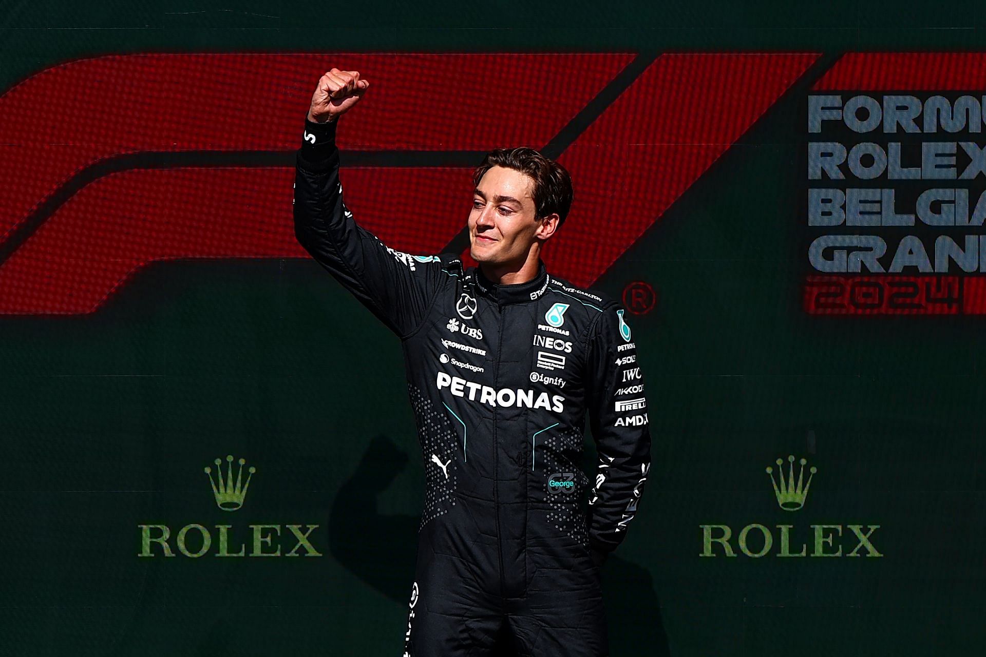 Race winner George Russell of Great Britain and Mercedes celebrates on the podium during the F1 Grand Prix of Belgium at Circuit de Spa-Francorchamps on July 28, 2024 in Spa, Belgium. (Photo by Dean Mouhtaropoulos/Getty Images)