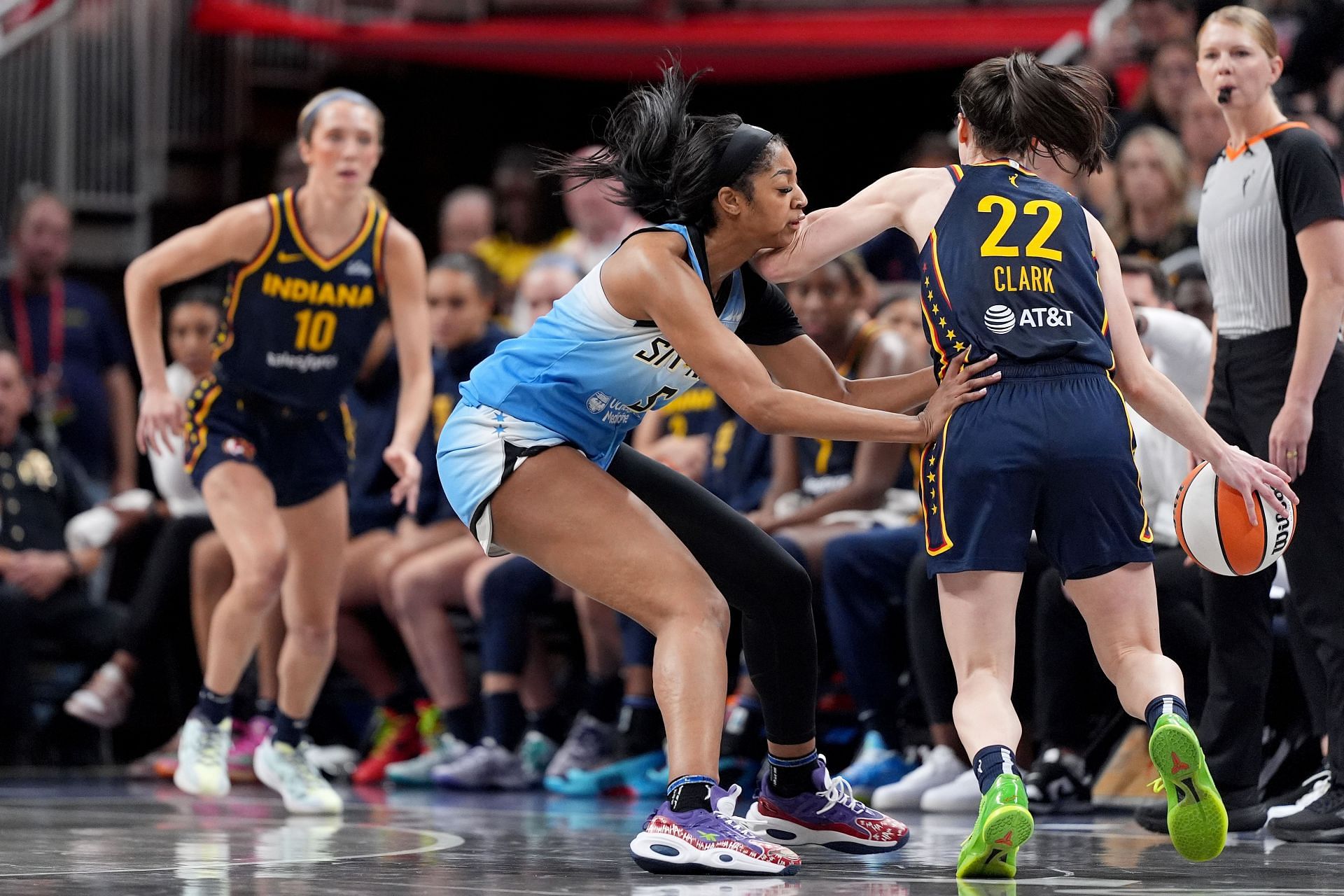 Angel Reese of the Chicago Sky fouls Caitlin Clark of the Indiana Fever during the second half at Gainbridge Fieldhouse (Photo by Emilee Chinn/Getty Images). )