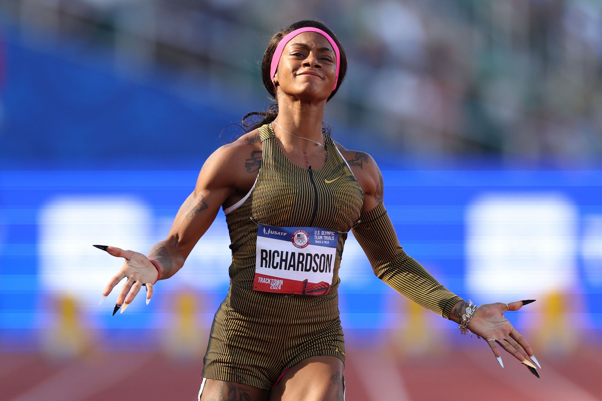 Sha&#039;Carri Richardson crosses the finish line of the women&#039;s 100m semi-final at the 2024 U.S. Olympic Team Track &amp; Field Trials at Hayward Field in Eugene, Oregon. (Photo by Getty Images)