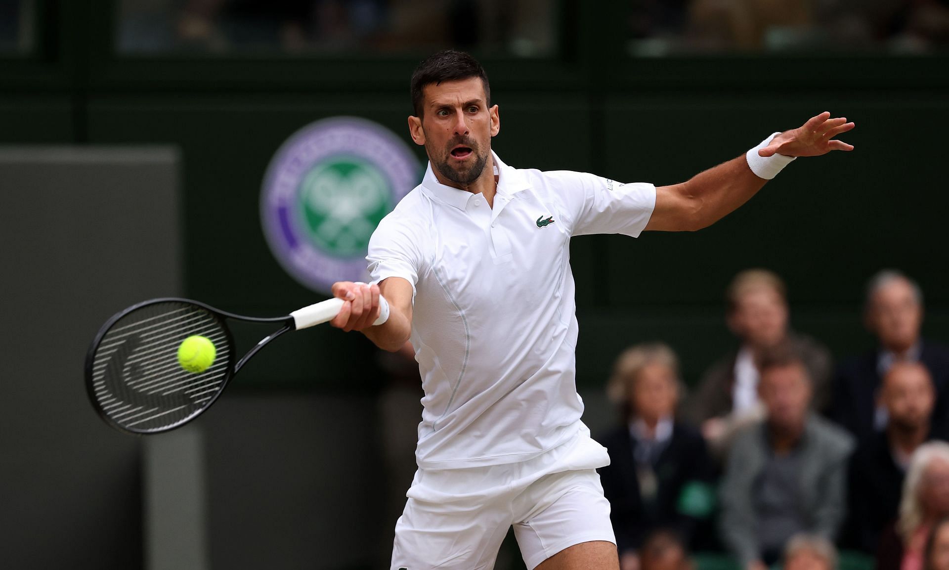 The Serb in action at Wimbledon 2024